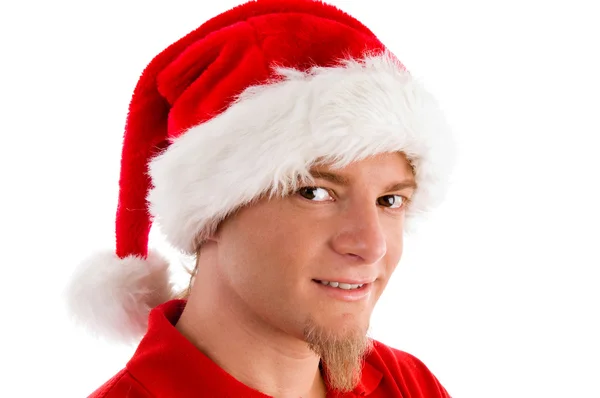 Erkek giyen Noel şapka gülümseyen — Stok fotoğraf