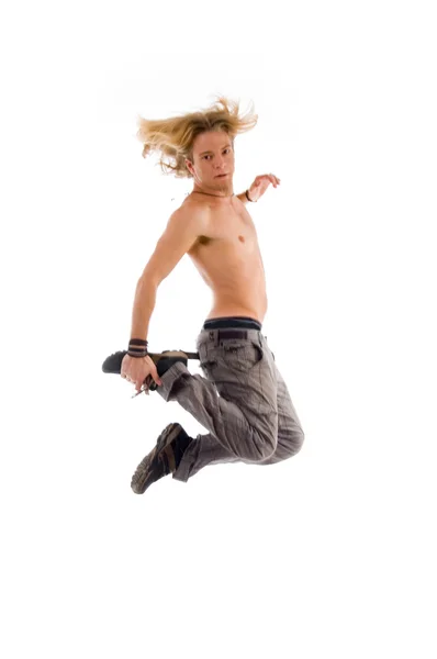 Cool macho pulando alto no ar — Fotografia de Stock