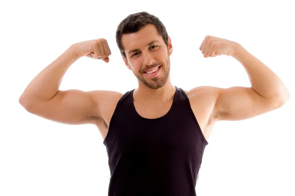 Hombre fuerte mostrando sus músculos — Foto de Stock