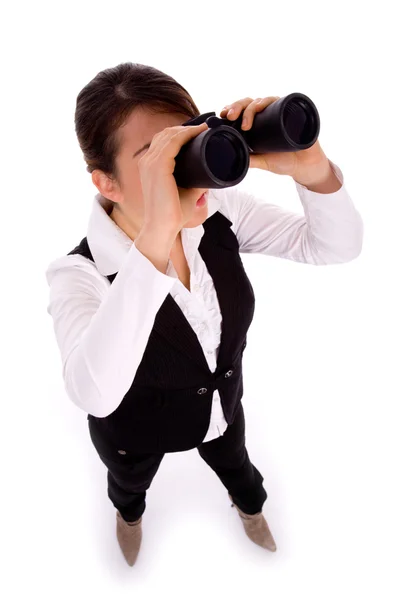 Mujer de negocios viendo a través de prismáticos —  Fotos de Stock