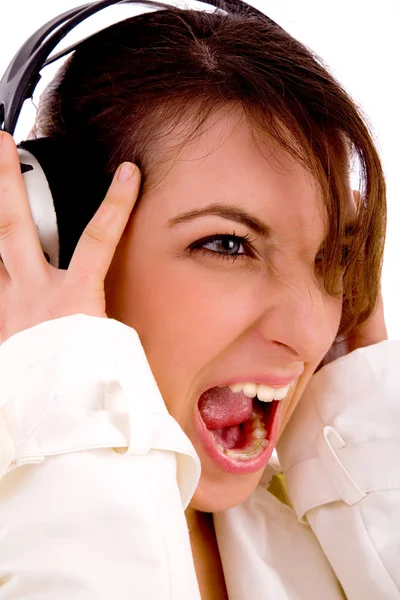 Screaming woman listening to music — Stock Photo, Image