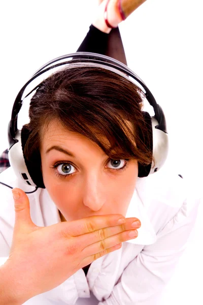 Amazed woman listening to music — Stock Photo, Image