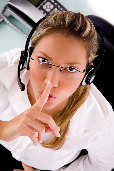 Service provider instructing silence — Stock Photo, Image