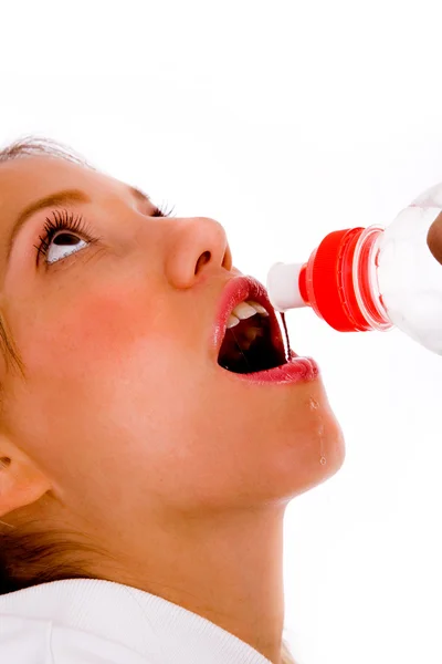 Tired female drinking water — Stock Photo, Image