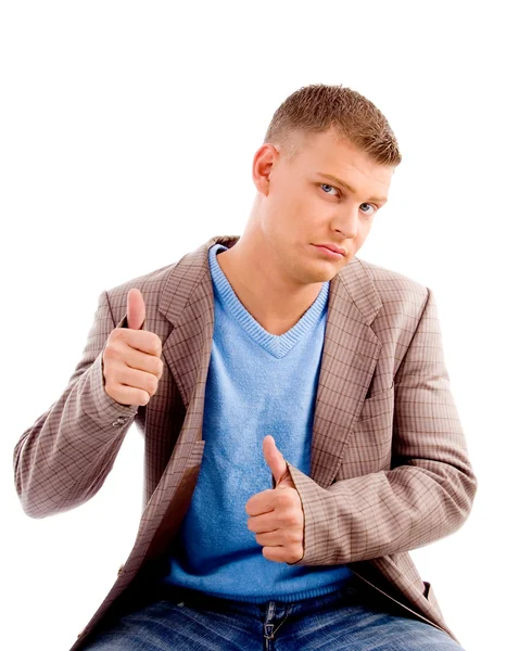 Pohledný muž ukazuje palec — Stock fotografie