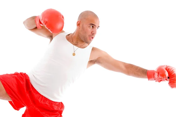 Male boxer in pose to punch hard — Stock Photo, Image