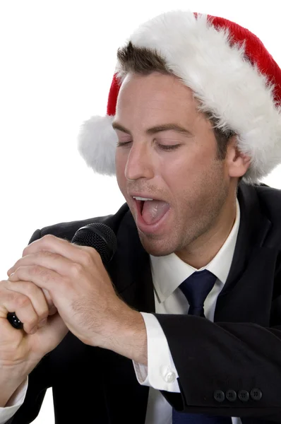 Businessman singing into a microphone — Stock Photo, Image