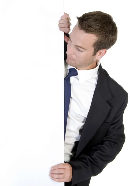 Uomo d'affari posa con bordo bianco — Foto Stock