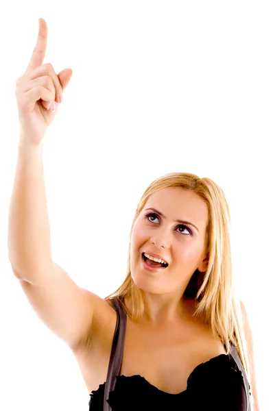 Front view of female pointing upwards — Stock Photo, Image