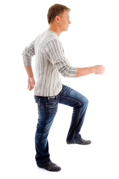 Pohledný muž dělat chůze gesto — Stock fotografie