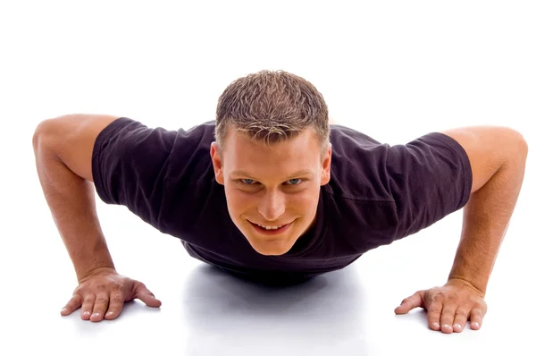 Usmívající se muž dělá push up — Stock fotografie