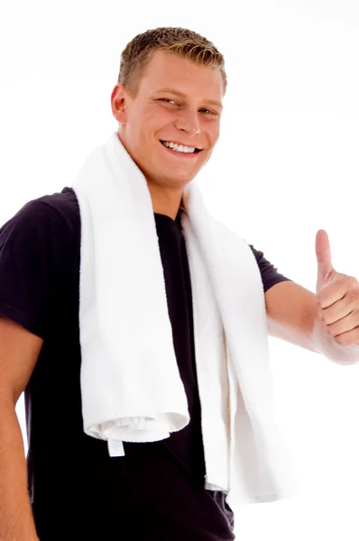 Muscular male showing thumbs up — Stock Photo, Image
