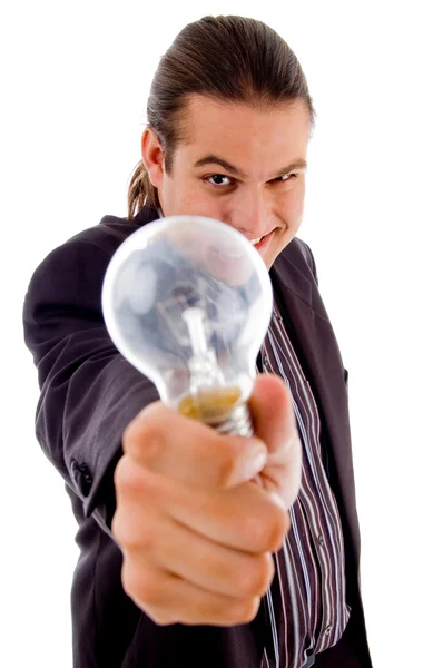Young male holding electric bulb — Stock Photo, Image