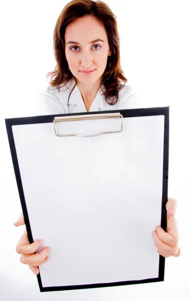 Doctor showing her blank clipboard — Stock Photo, Image