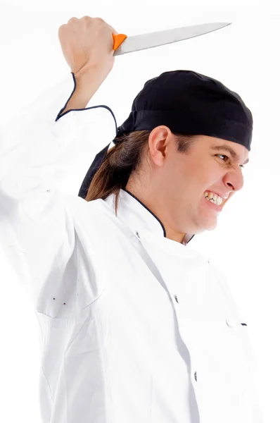 Perigoso jovem chef masculino com faca — Fotografia de Stock