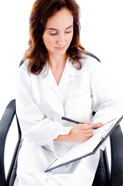 Cirujano femenino escribir prescripción —  Fotos de Stock