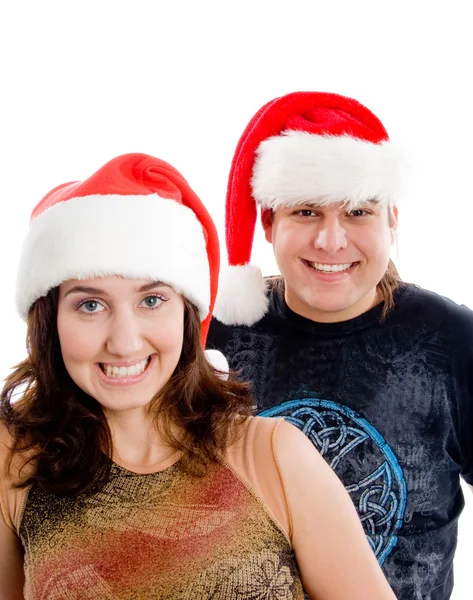 Brunetka szczęśliwa para w Boże Narodzenie kapelusz — Zdjęcie stockowe