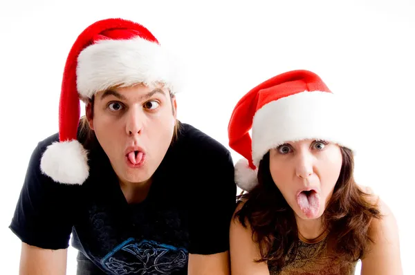 Christmas couple making weird faces — Stock Photo, Image
