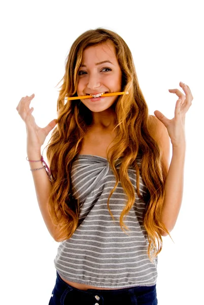 Adolescente in eccitazione masticare matita — Foto Stock