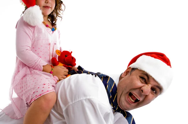 Girl riding on father's back — Stock Photo, Image