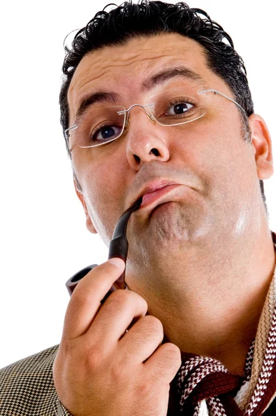 Close up of man smoking tobacco pipe — Stock Photo, Image