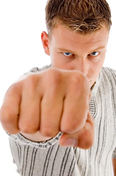 Handsome guy showing fist — Stock Photo, Image