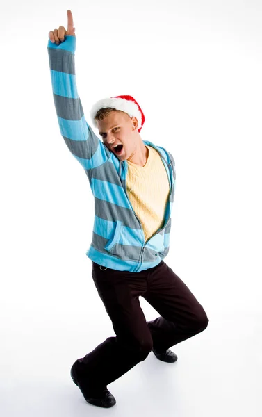 クリスマスの帽子を持つポインティング男性 — ストック写真