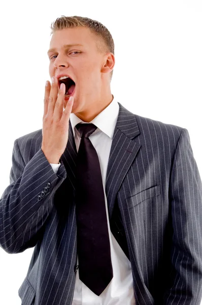 Yawning young businessman — Stock Photo, Image