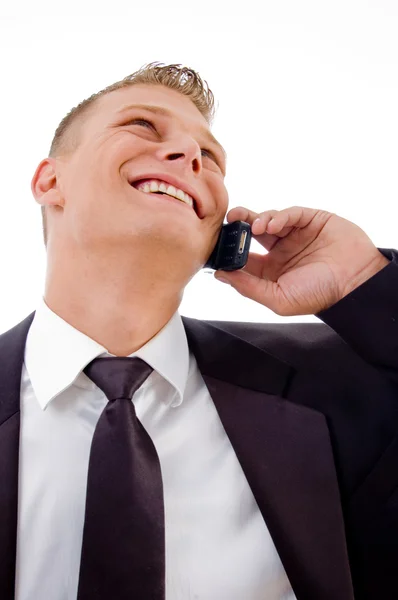 Young accountant talking on cell phone — Stock Photo, Image