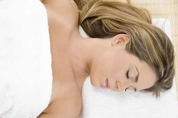 Sleeping young female in spa — Stock Photo, Image