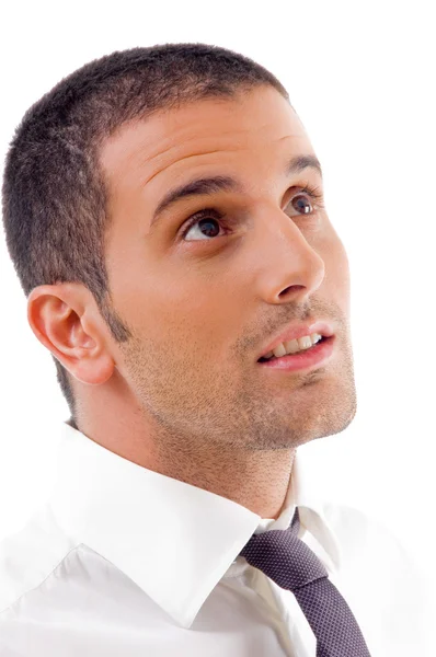 Close up of young guy looking upwards — Stock Photo, Image