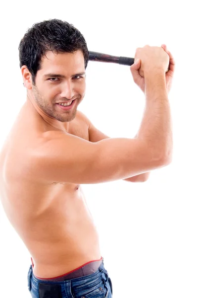 Side pose of smiling man with stick — Stock Photo, Image