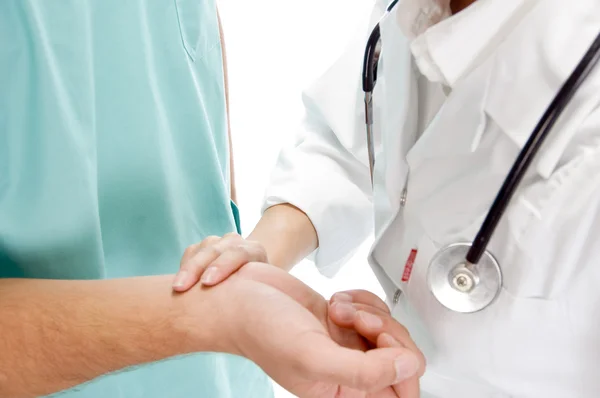 Close view of doctor checking pulse — Stock Photo, Image