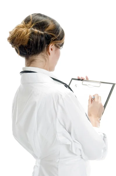 Female doctor writing prescription — Stock Photo, Image
