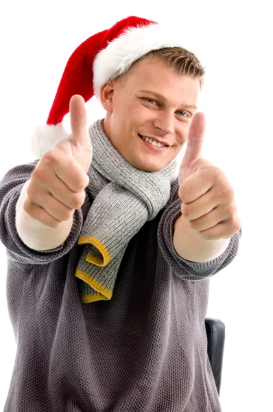 Різдвяний хлопець показує великий палець вгору — стокове фото