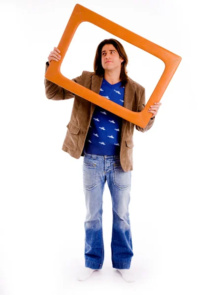 Cool guy looking through frame — Stock Photo, Image