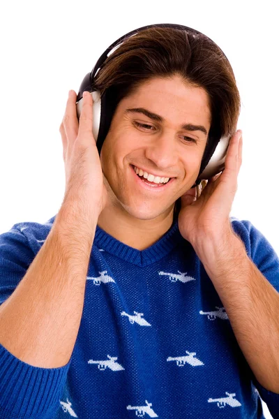 Handsome youth enjoying music — Stock Photo, Image