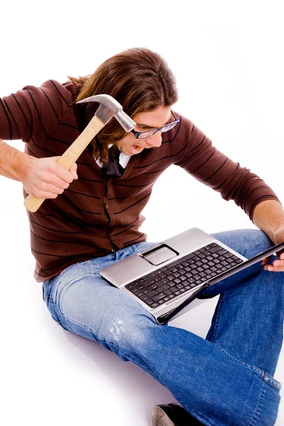 Angry male striking laptop — Stock Photo, Image
