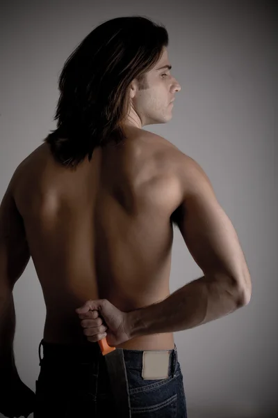 Postura traseira do homem muscular — Fotografia de Stock