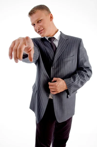 Young businessman pointing at camera — Stock Photo, Image