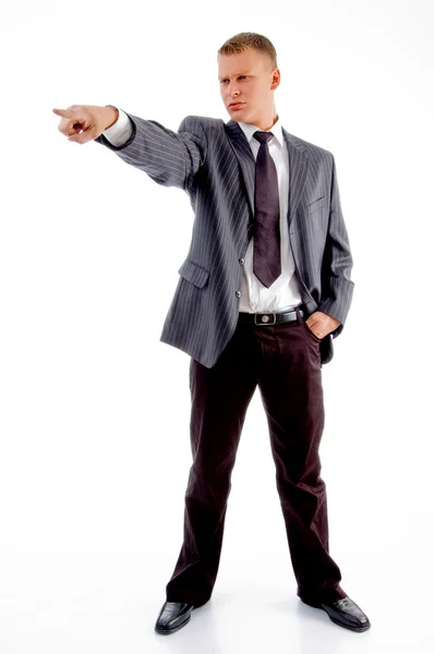Standing adult employee pointing — Stock Photo, Image