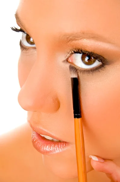 Close up of female putting liner — Stock Photo, Image