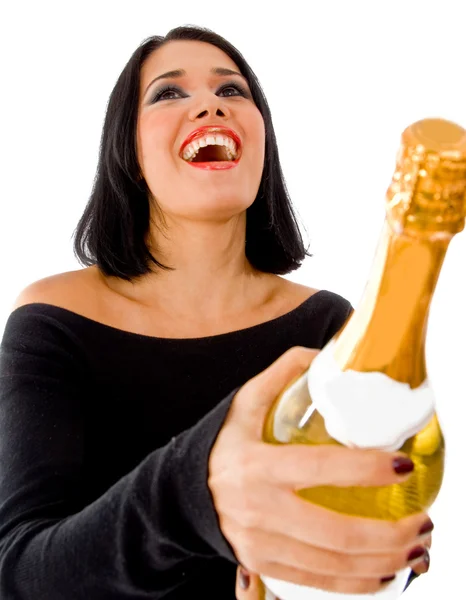 Modelo feliz segurando garrafa de champanhe — Fotografia de Stock