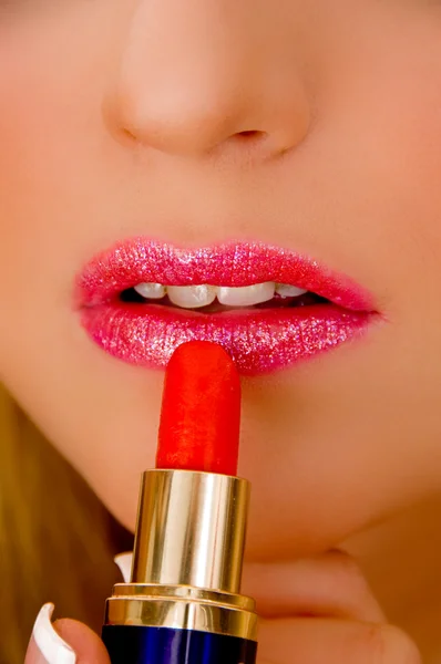 stock image Close view of model applying lipstick