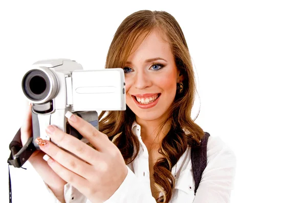 Smiling female carrying video camera — Stock Photo, Image