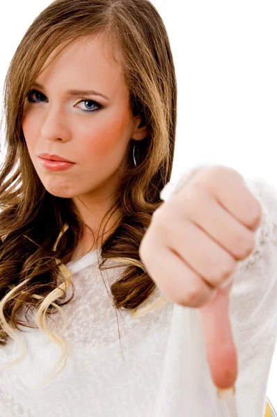 Young female with thumbs down — Stock Photo, Image
