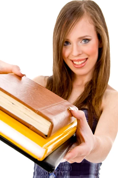 Smiling student showing books — Stock Photo, Image