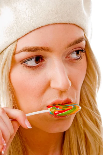 Female licking candy — Stock Photo, Image