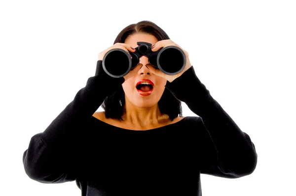 Woman looking through binoculars Royalty Free Stock Photos