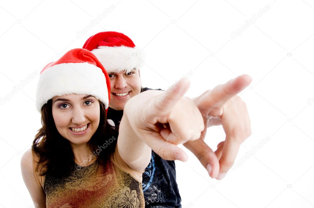 Portrait of pointing couple smiling